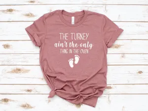 Turkey in the Oven - The Turkey Ain't the Only thing in the Oven - Pregnancy Announcement T Shirt - Funny Baby Tees